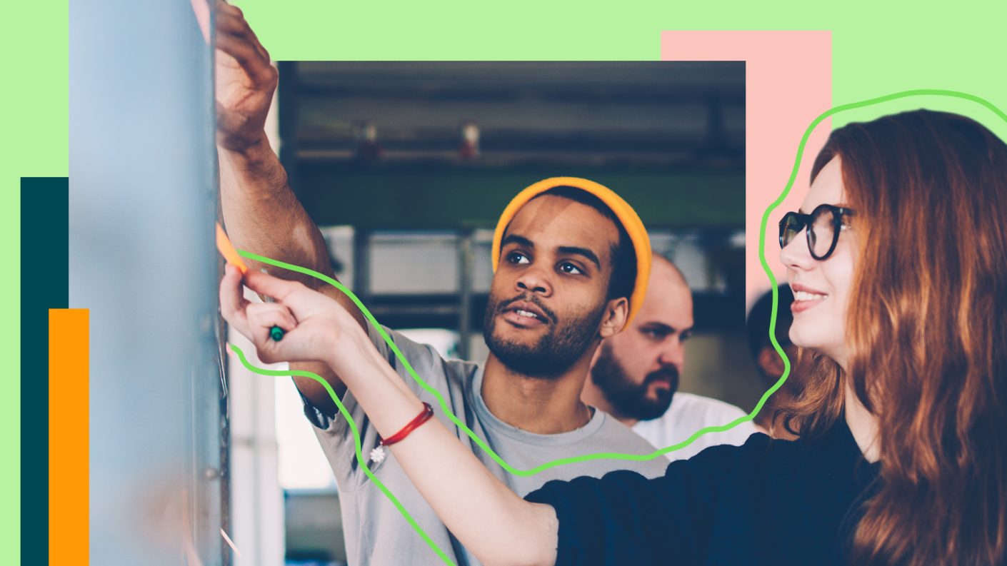 People collaborating on a whiteboard