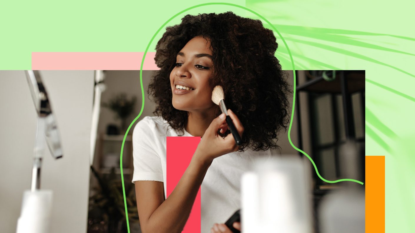 Woman applying make-up