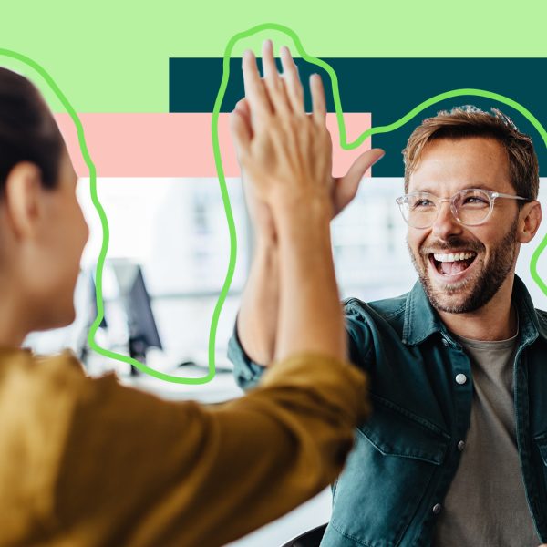 Two people giving a high five