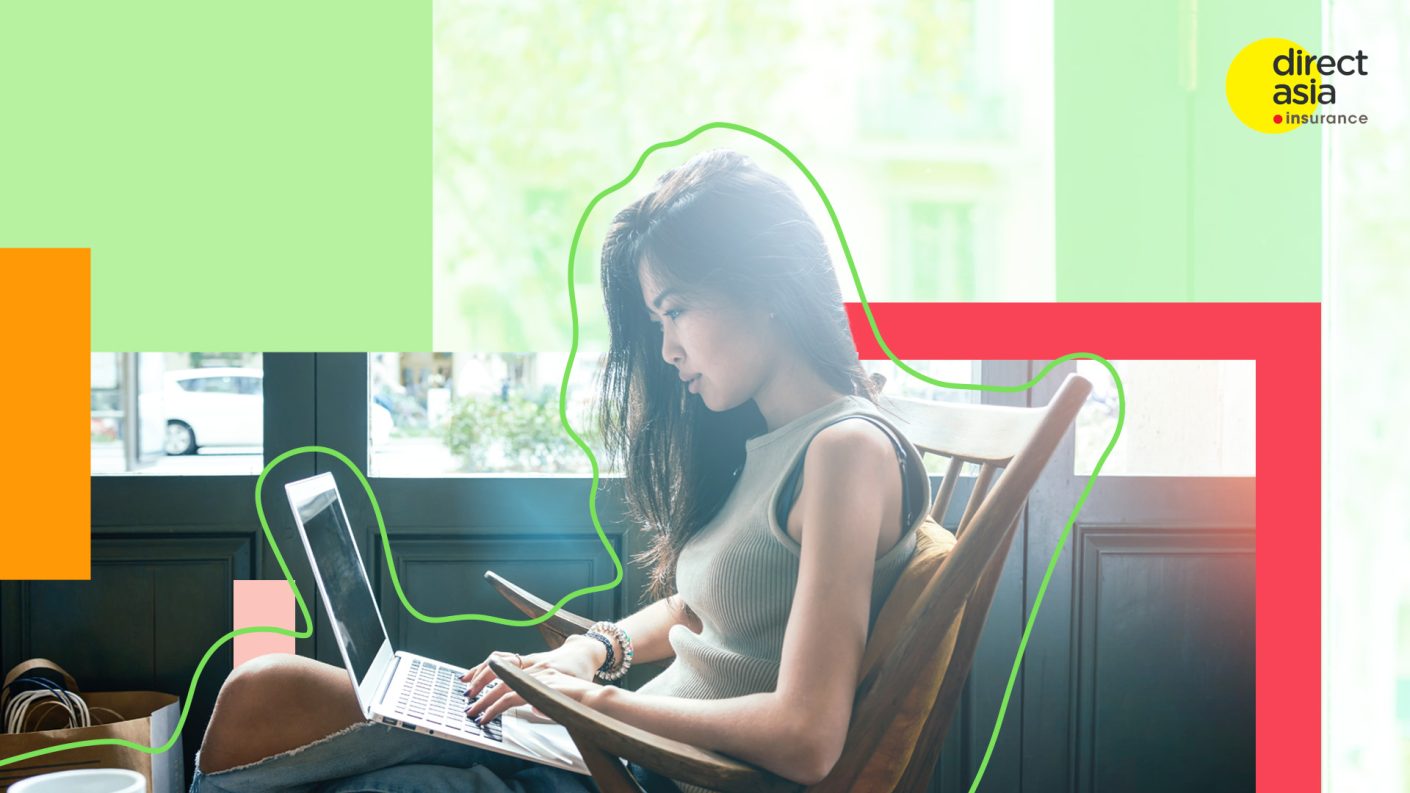 Woman typing on her laptop