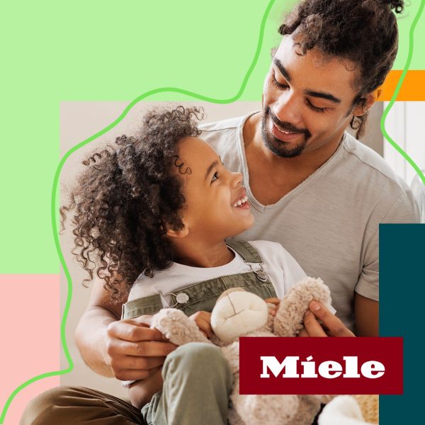 Father and son doing laundry