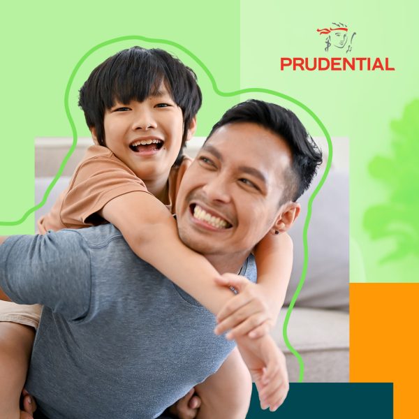 Man carrying young child on his back