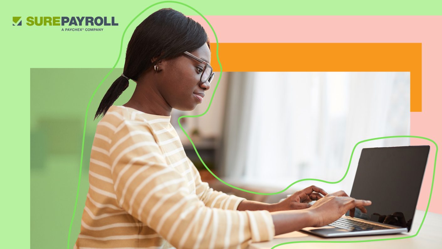 Woman typing on laptop